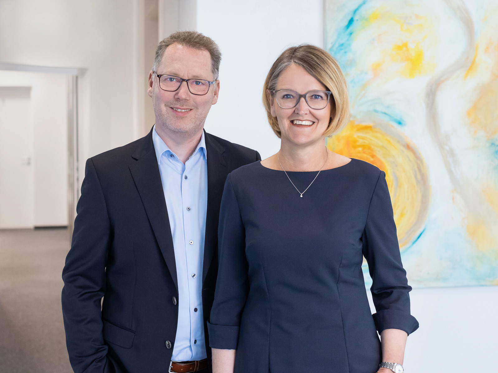 Gemeinschaftsportrait der Geschäftsleitung der LAUREUS AG PRIVAT FINANZ: Martin Dietz (links) und Anja Metzger (rechts)
